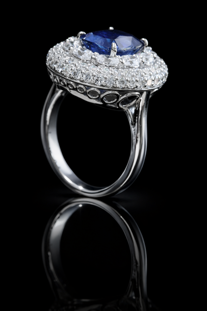 Blue Sapphire & Diamond Halo Ring in White Gold | 7.18 CTW