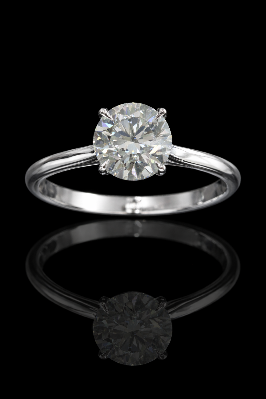 Round Brilliant Natural Diamond Solitaire Engagement Ring in White Gold | Classic Four-Prong Design