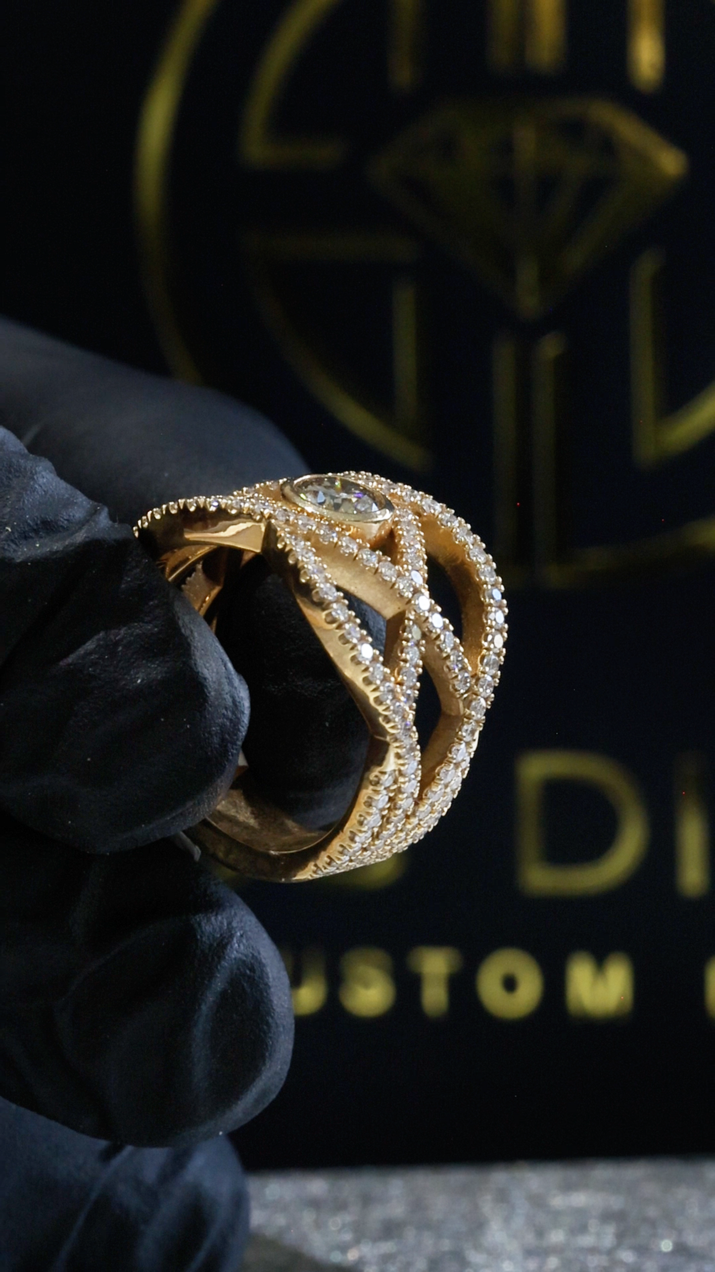 Natural Fancy Yellow Diamond Infinity Ring with Pavé Crisscross Design in Yellow Gold | Elegant Statement Style