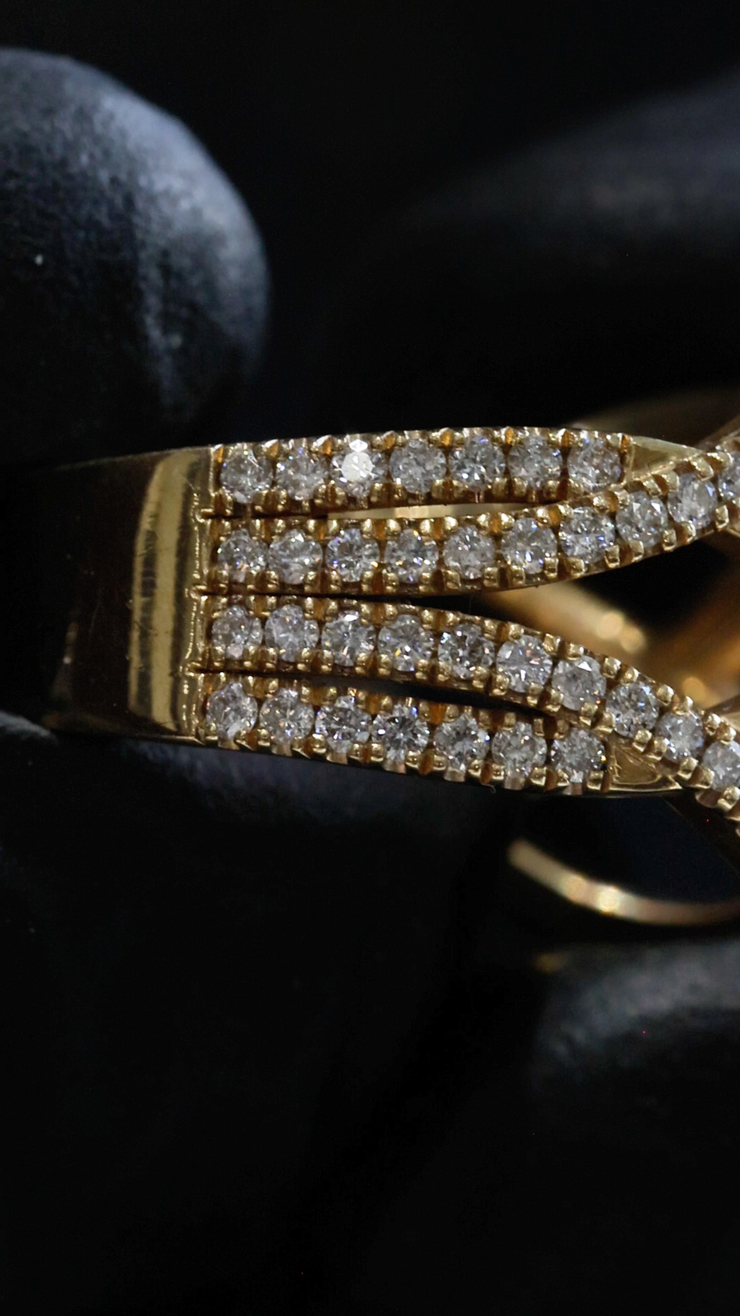 Natural Fancy Yellow Diamond Infinity Ring with Pavé Crisscross Design in Yellow Gold | Elegant Statement Style