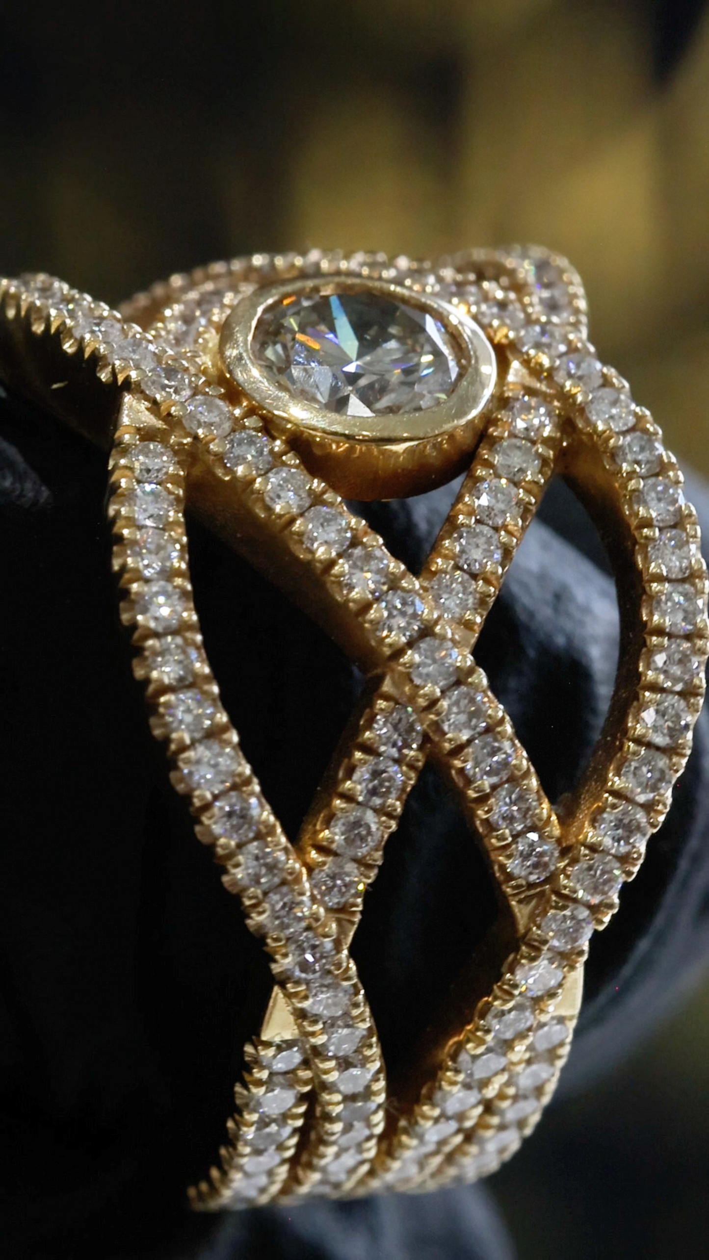 Natural Fancy Yellow Diamond Infinity Ring with Pavé Crisscross Design in Yellow Gold | Elegant Statement Style