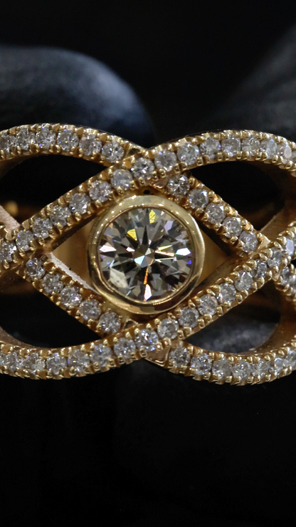 Natural Fancy Yellow Diamond Infinity Ring with Pavé Crisscross Design in Yellow Gold | Elegant Statement Style