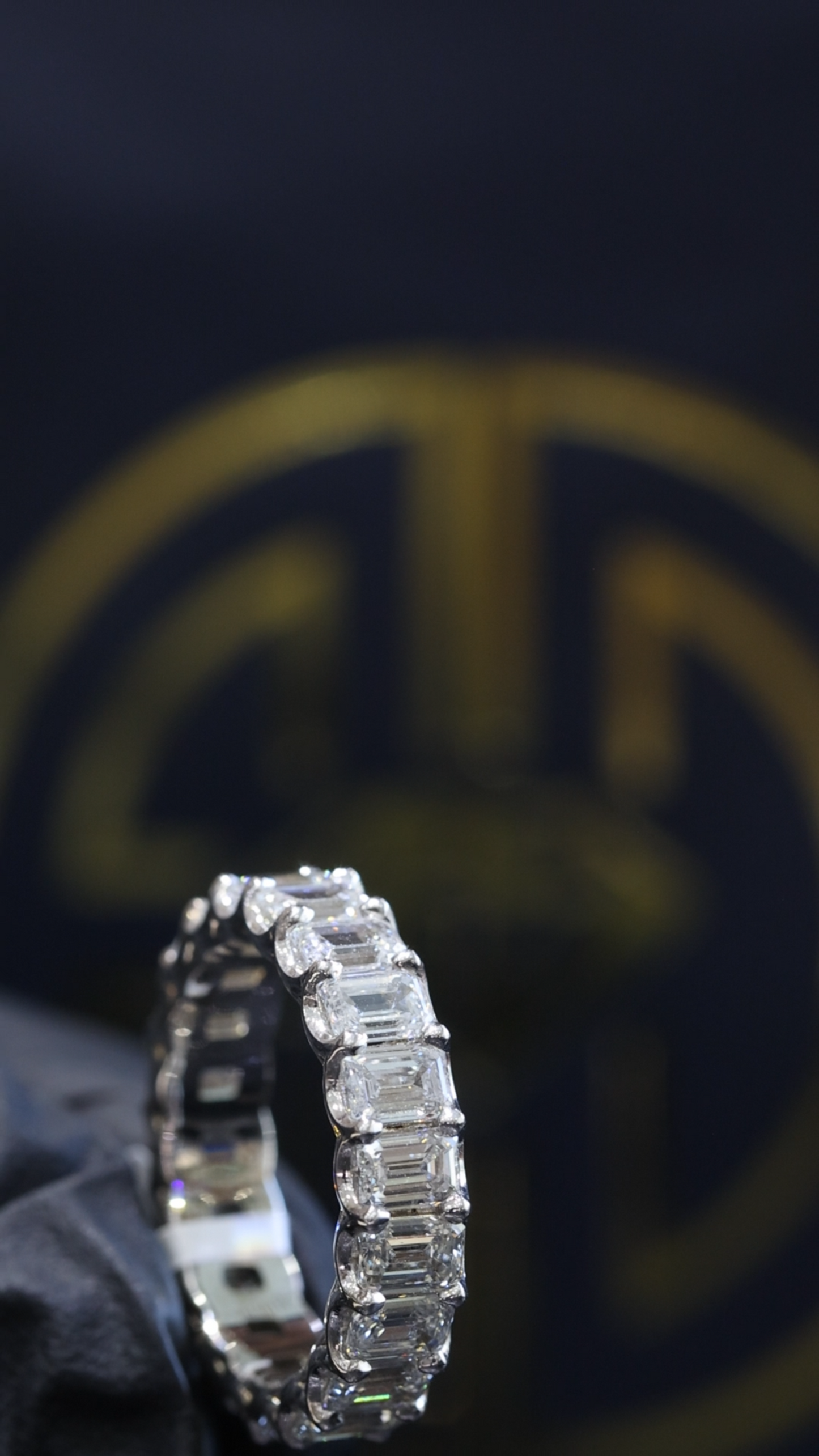 Emerald Cut Diamond Eternity Band in White Gold | 5.29 CTW