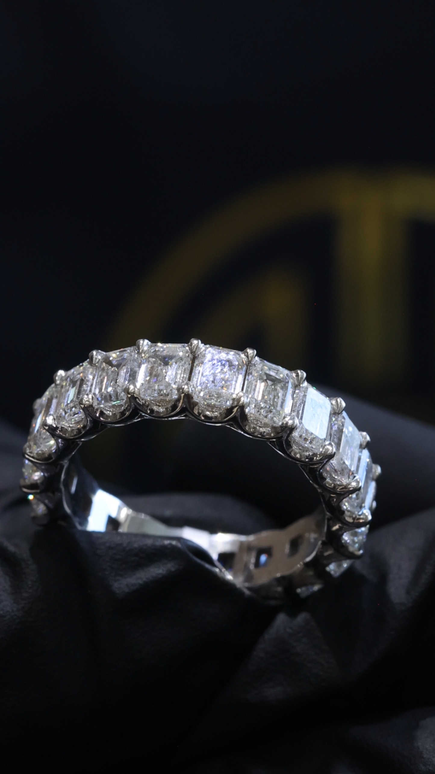 Emerald Cut Diamond Eternity Band in White Gold | 6.01 CTW