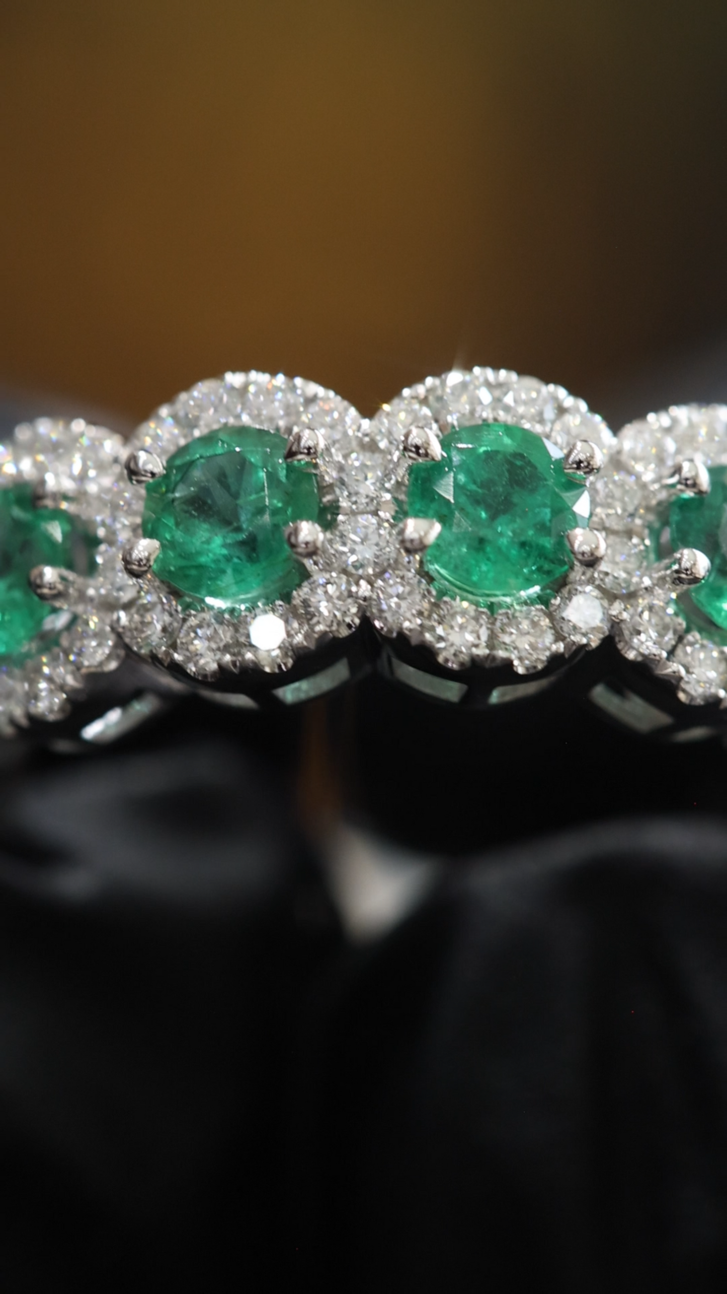 Emerald & Diamond Halo Band in White Gold | Round Emeralds & Brilliant Diamond Accents