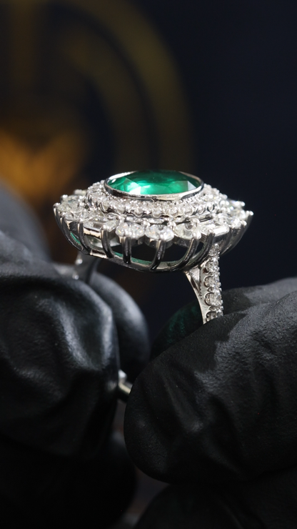 Oval Emerald Halo Ring in White Gold | Diamond Accents & Classic Double Halo Design
