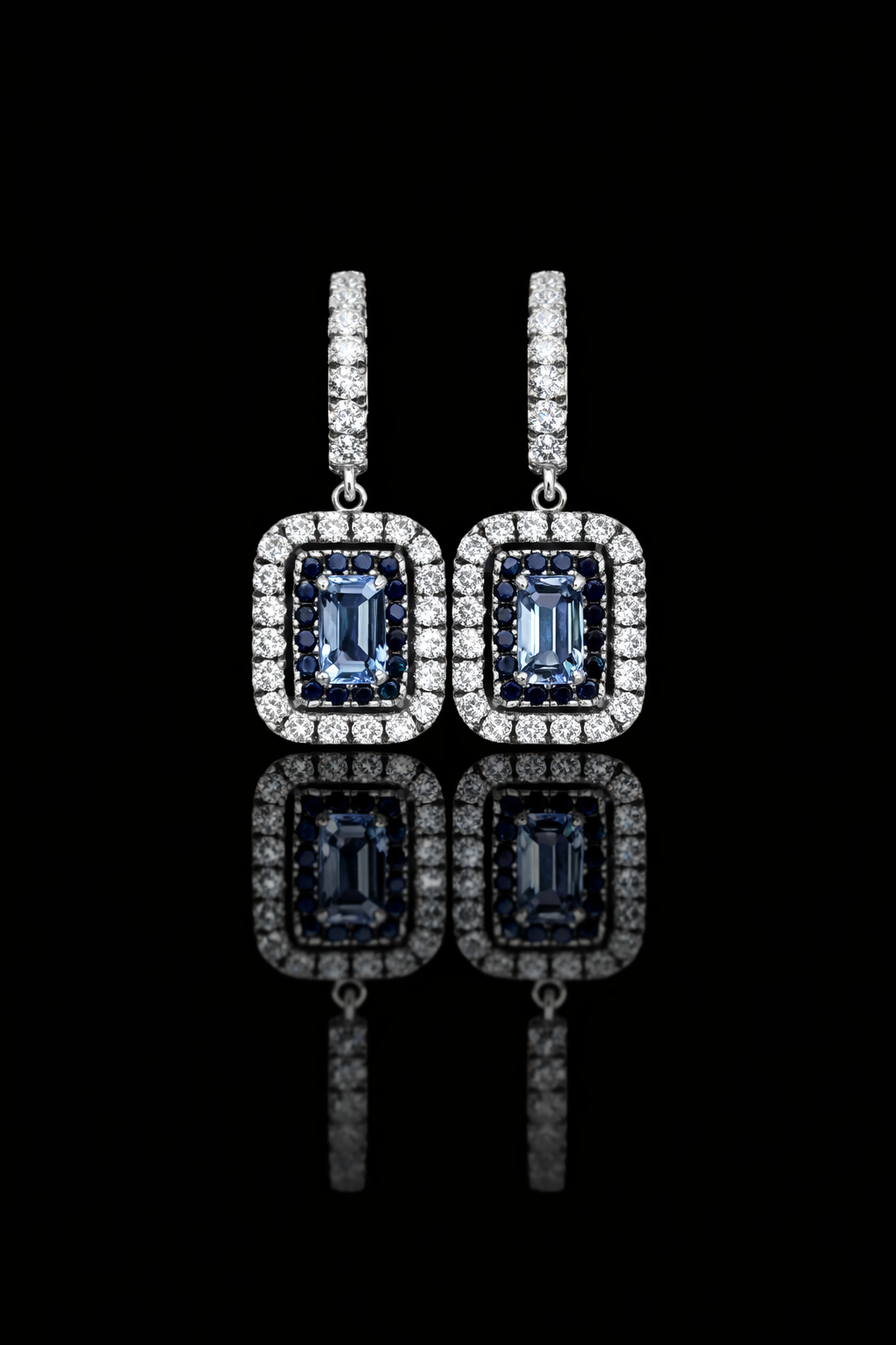 Natural emerald-cut sapphire double halo drop earrings in 14K white gold with 0.78CT G-H SI diamonds – Houston fine jewelry by Endless Diamonds.