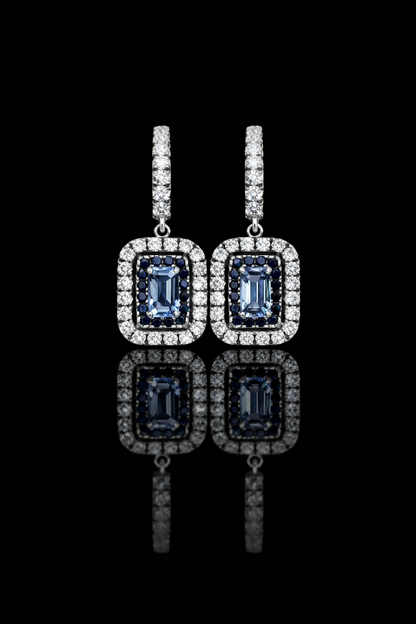 Natural emerald-cut sapphire double halo drop earrings in 14K white gold with 0.78CT G-H SI diamonds – Houston fine jewelry by Endless Diamonds.