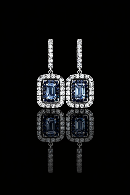 Natural emerald-cut sapphire double halo drop earrings in 14K white gold with 0.78CT G-H SI diamonds – Houston fine jewelry by Endless Diamonds.