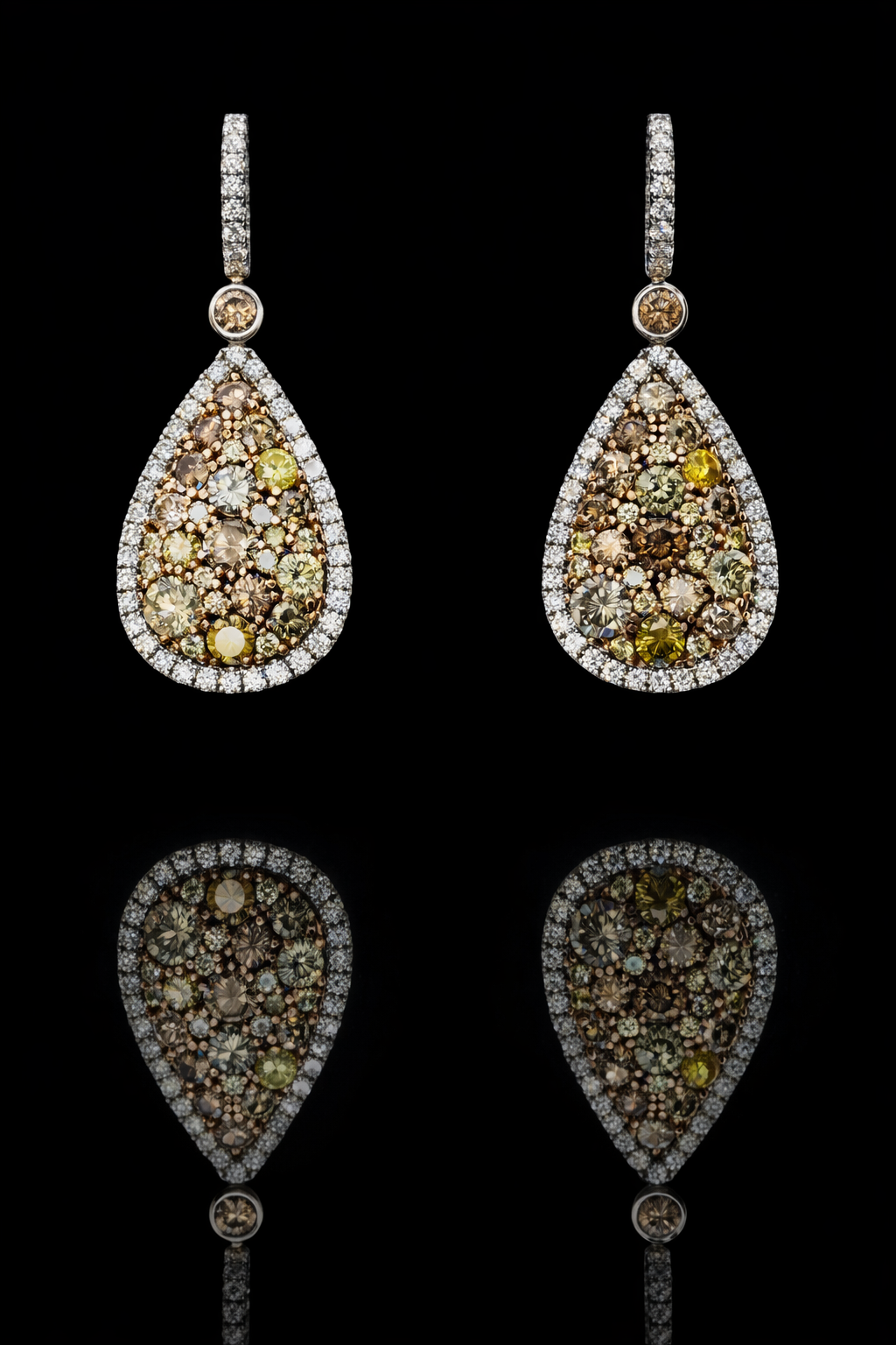 Fancy yellow diamond teardrop halo drop earrings in 14K white gold with 5.49CT VS–SI natural colored diamonds – luxury Houston fine jewelry by Endless Diamonds.