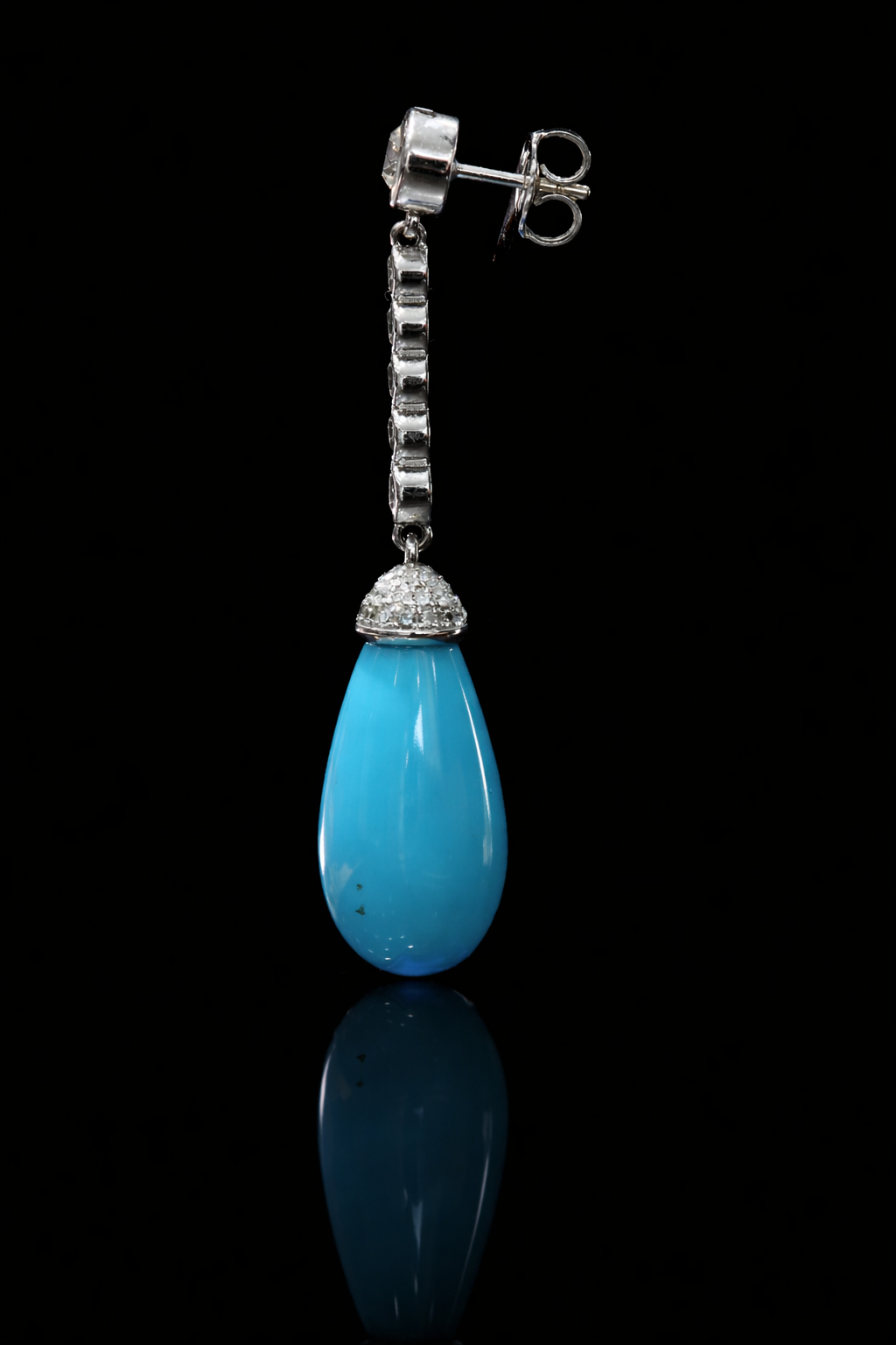 14K white gold diamond drop earrings with pear-shaped blue tourmaline gemstones and bezel-set diamond chain