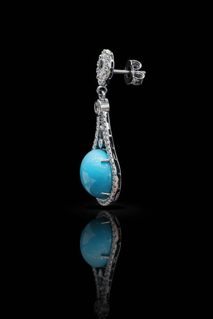 14K white gold tourmaline diamond halo drop earrings with pavé diamond frame and blue cabochon tourmaline center