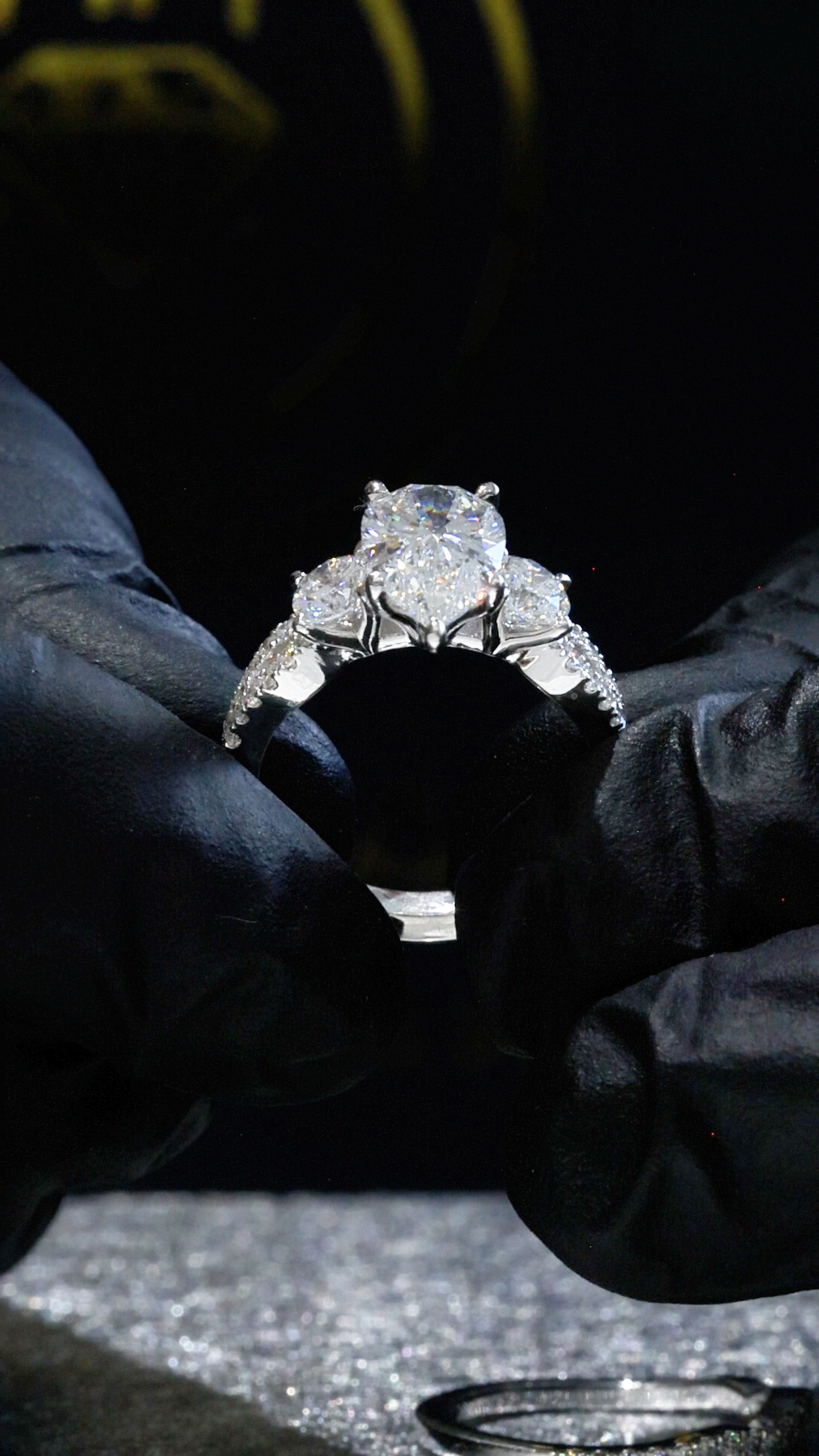 Pear-Cut Lab-Grown Diamond Engagement Ring with Round Side Accents in White Gold | Prong-Set Design