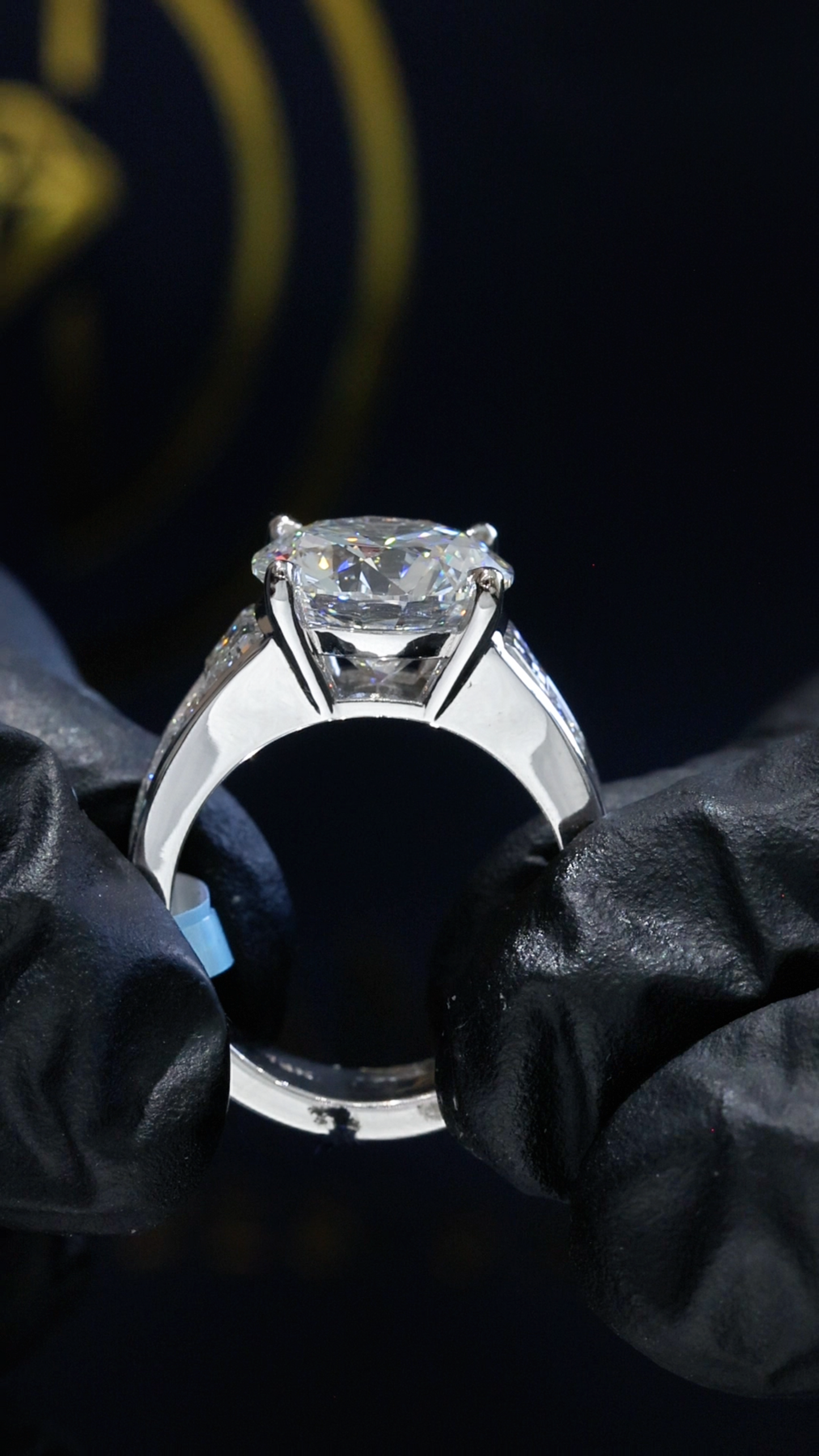 Round-Cut Lab-Grown Diamond Engagement Ring in White Gold | Baguette Side Stone Setting