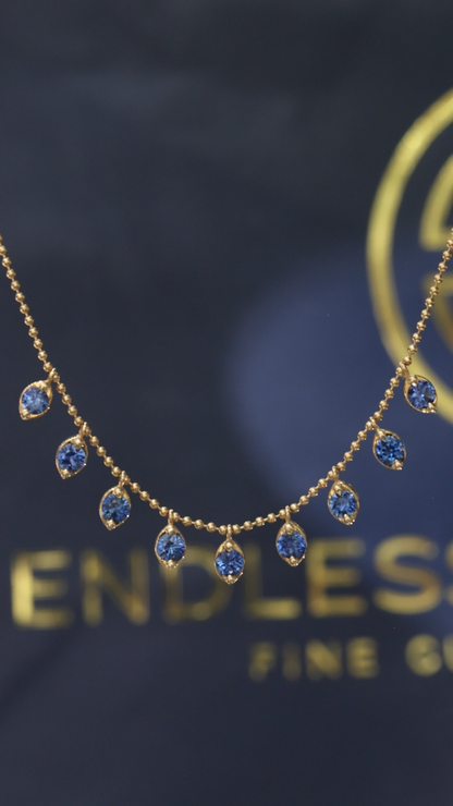 Natural Blue Sapphire Bezel Dangle Necklace in 14K Yellow Gold | Delicate Drop Station Design