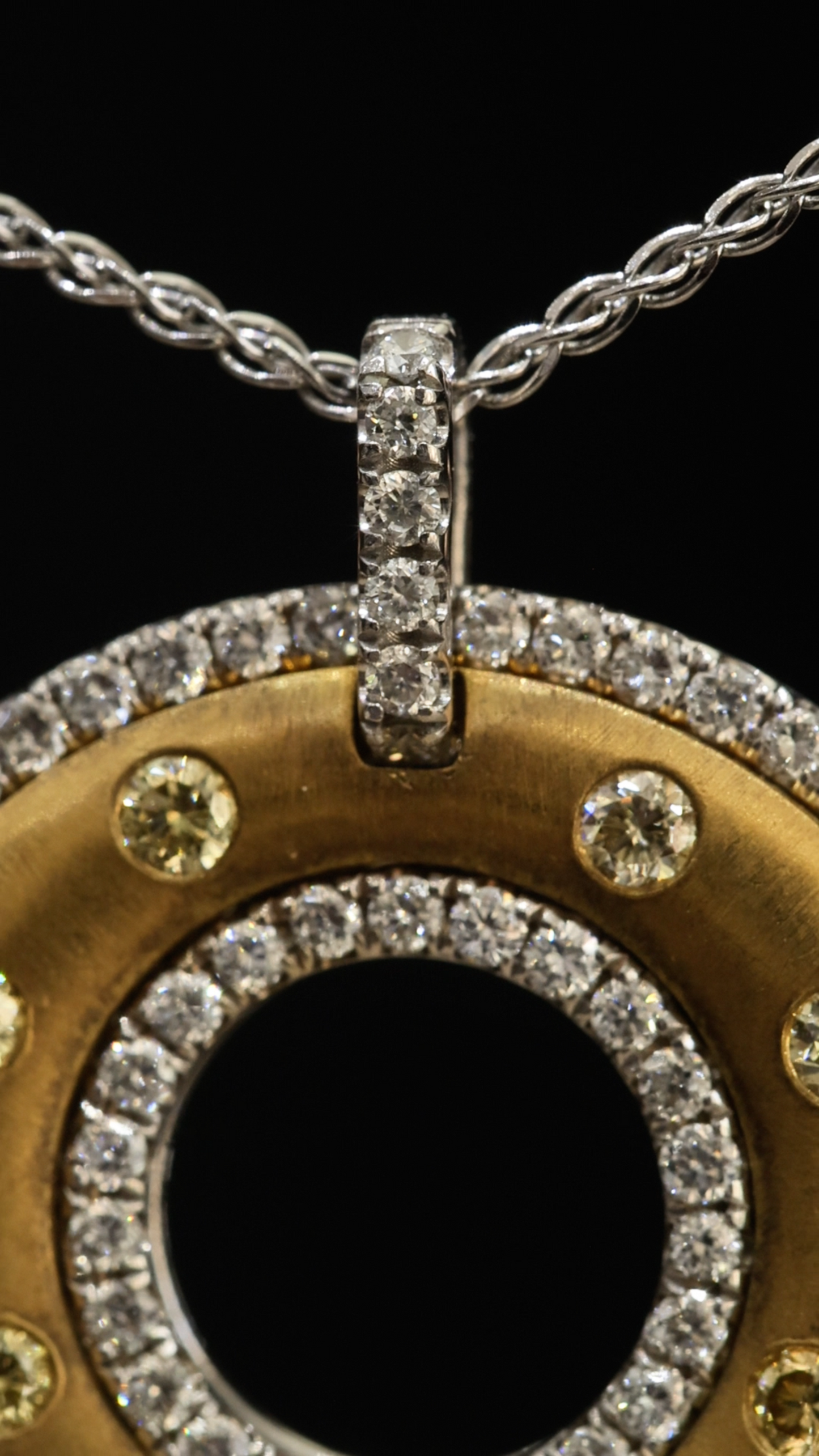 Natural Fancy Yellow Diamond Open Circle Pendant with Pavé Halo in Two-Tone Gold | Modern Luxury Design