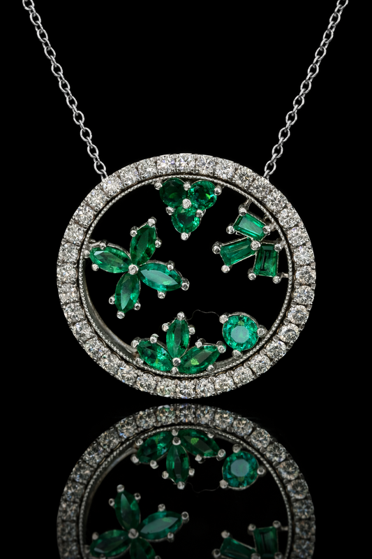 14K white gold emerald floral halo pendant with 0.88 carat emerald cluster and 0.74 carat G-H SI diamond circle frame