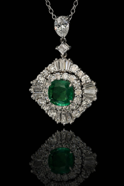 14K white gold emerald halo pendant with 1.00 carat cushion cut emerald and 2.01 carat G-H VS-SI diamond cluster setting