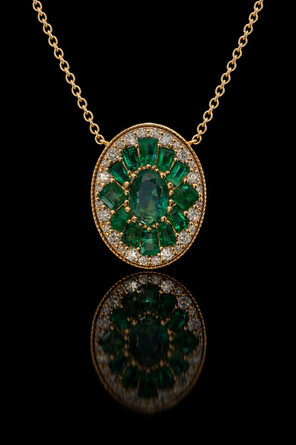 14K yellow gold emerald cluster halo pendant with 1.00 carat oval emerald and 0.20 carat G-H SI diamond frame