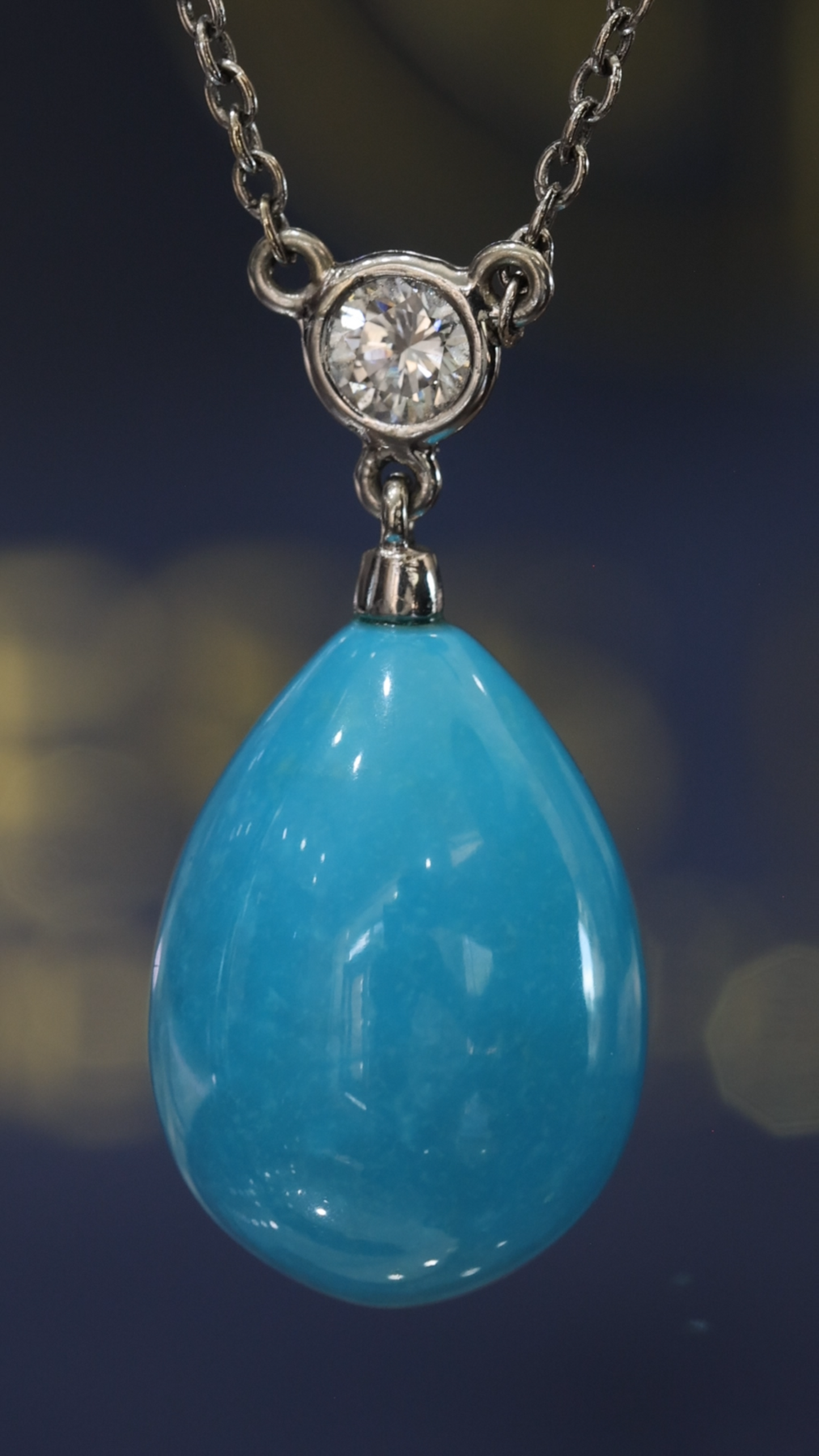 14K yellow gold turquoise teardrop pendant with bezel-set 0.24 carat G-H SI diamond connector