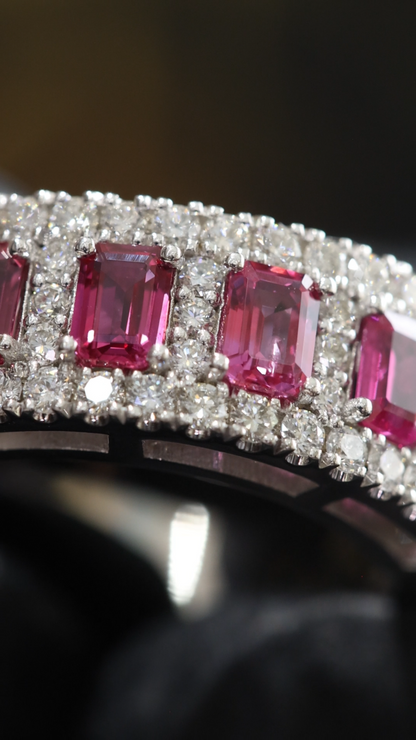 Crimson Gallery Ruby Eternity Band in White Gold | Emerald-Cut Rubies with Diamond Halo Rows