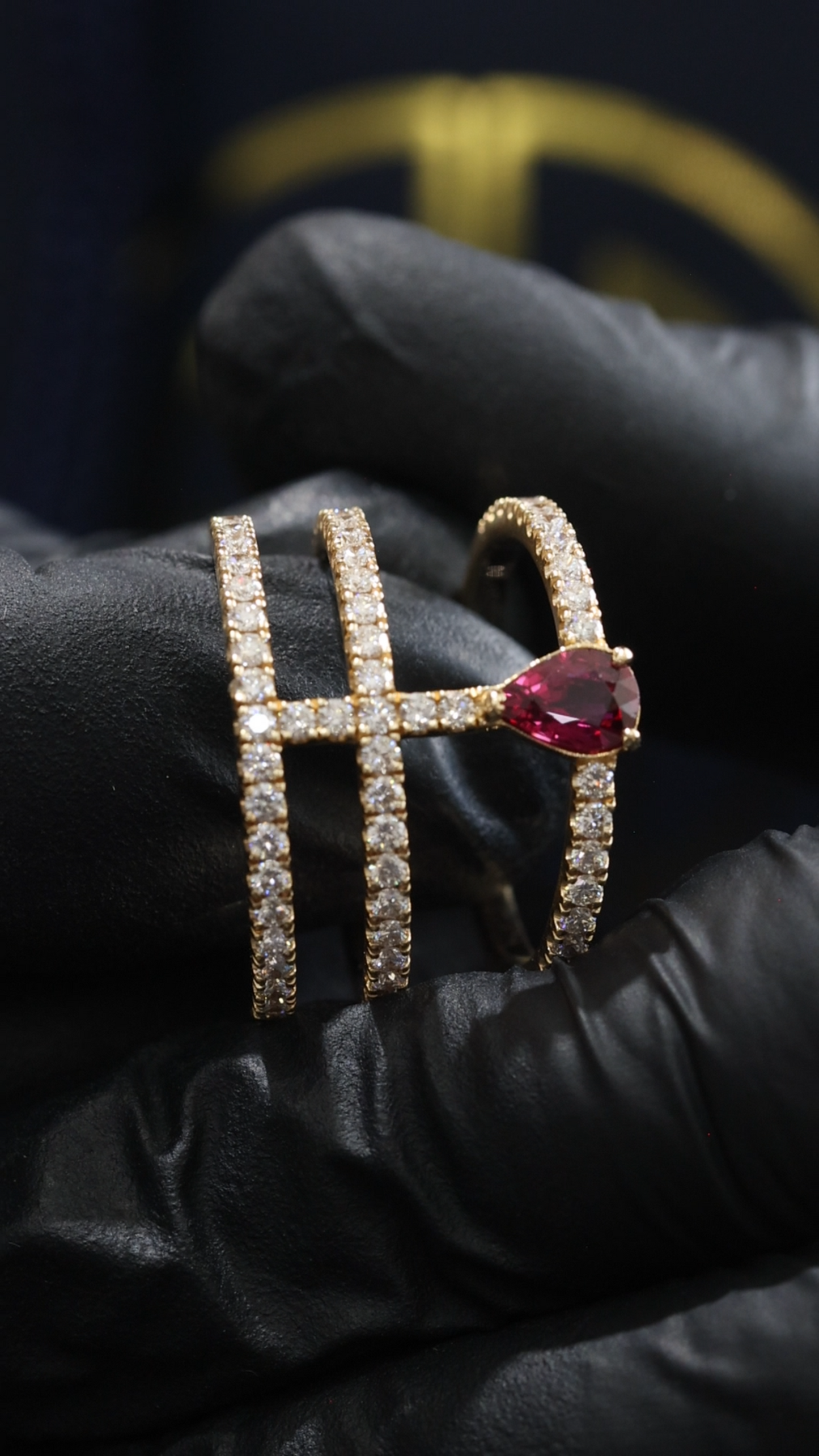 Radiant Ruby Pear Cross-Bar Ring in Yellow Gold | Triple Diamond Band Statement Design