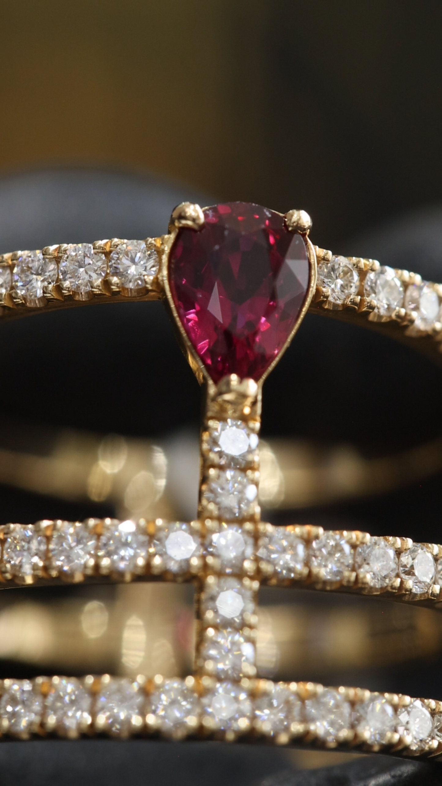 Radiant Ruby Pear Cross-Bar Ring in Yellow Gold | Triple Diamond Band Statement Design