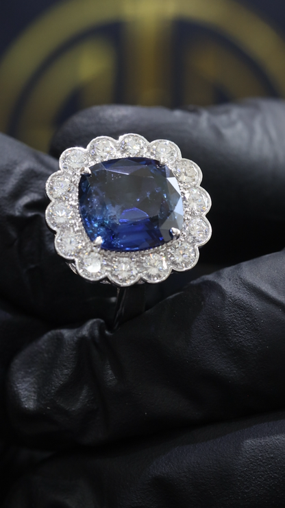 Sapphire & Diamond Halo Ring in White Gold | 6.73 CT Sapphire + 1.77 CTW Diamonds