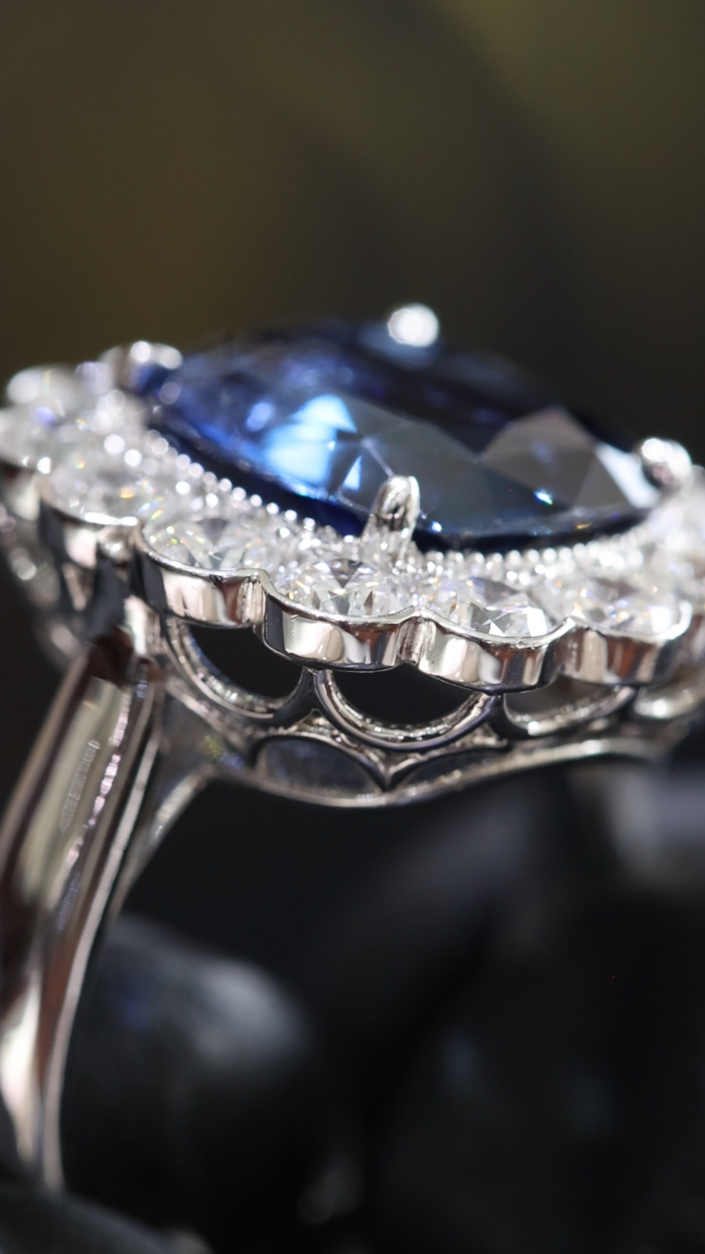 Sapphire & Diamond Halo Ring in White Gold | 6.73 CT Sapphire + 1.77 CTW Diamonds