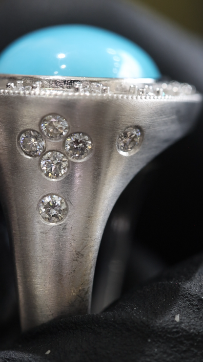 Grand Oval Turquoise Halo Ring in White Gold | Baguette Diamond Accents & Sculpted Diamond Shank