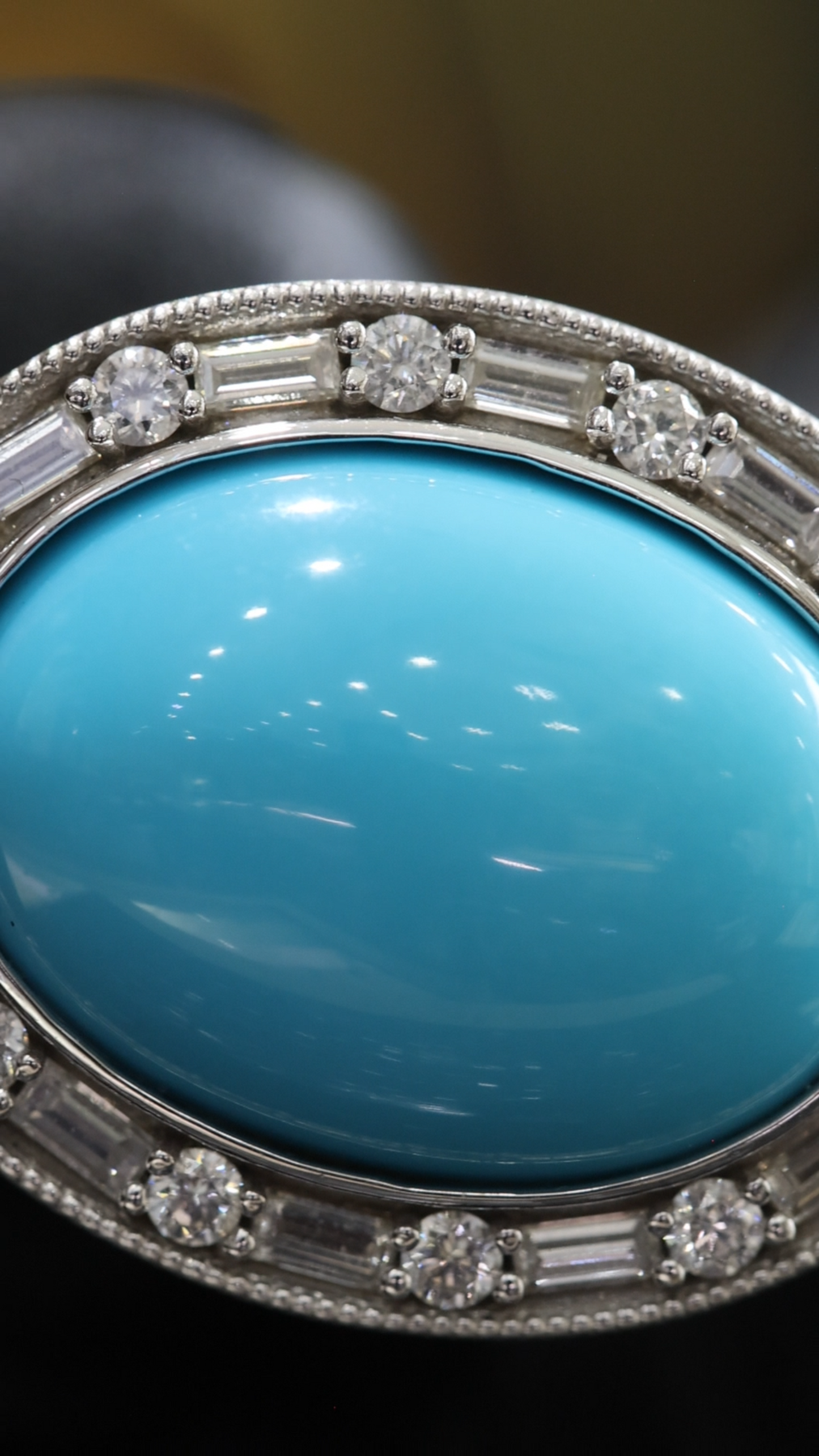 Grand Oval Turquoise Halo Ring in White Gold | Baguette Diamond Accents & Sculpted Diamond Shank