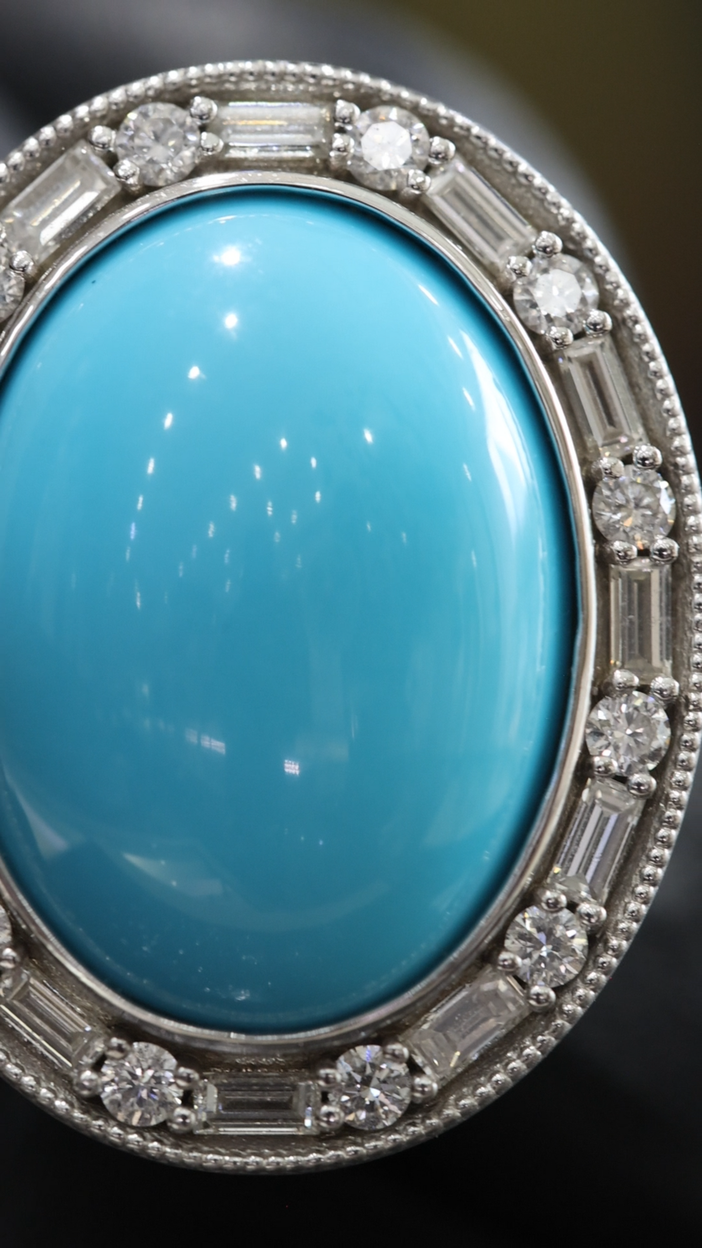 Grand Oval Turquoise Halo Ring in White Gold | Baguette Diamond Accents & Sculpted Diamond Shank