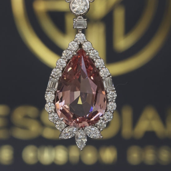 14K white gold pear shape morganite halo pendant with 6.01 carat center stone and 2.01 carat G-H SI diamond setting