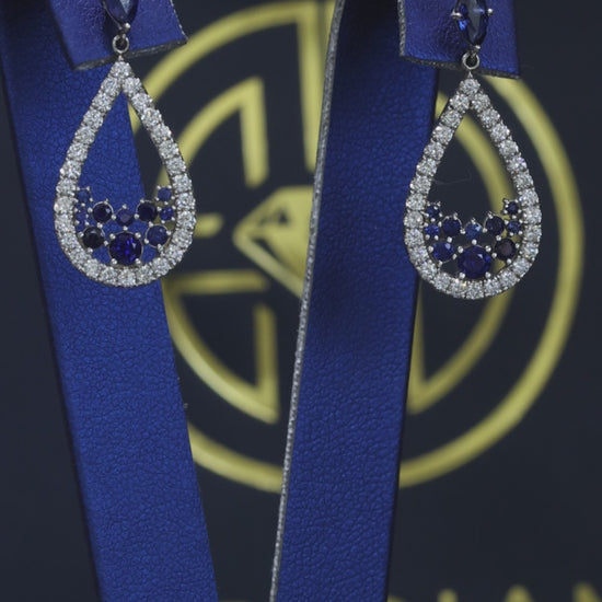 Natural sapphire diamond teardrop dangle earrings in 14K white gold with 1.00CT G-H SI pavé diamonds – luxury Houston fine jewelry by Endless Diamonds.