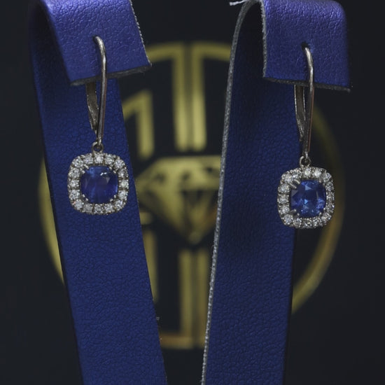 Natural cushion cut sapphire halo drop earrings in 14K white gold with 0.26CT G-H SI diamonds and lever-back closure – Houston fine jewelry by Endless Diamonds.