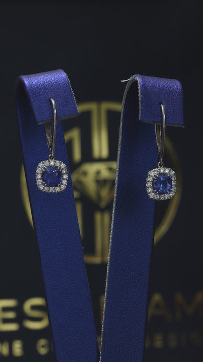 Natural cushion cut sapphire halo drop earrings in 14K white gold with 0.26CT G-H SI diamonds and lever-back closure – Houston fine jewelry by Endless Diamonds.