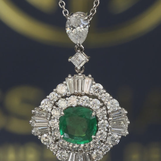 14K white gold emerald halo pendant with 1.00 carat cushion cut emerald and 2.01 carat G-H VS-SI diamond cluster setting