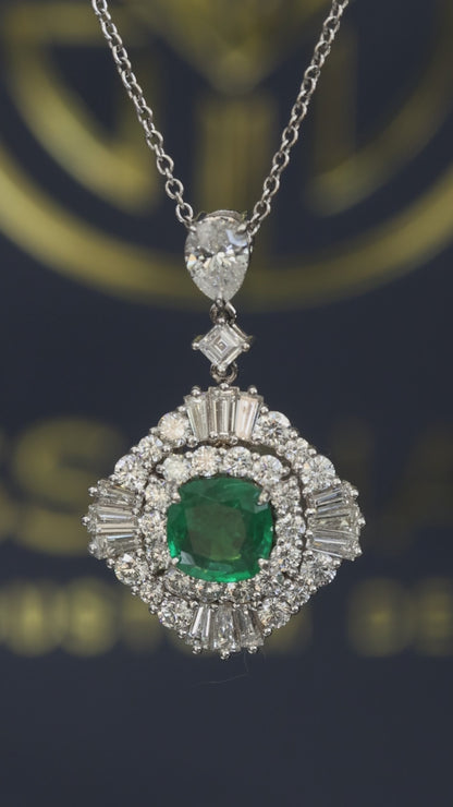 14K white gold emerald halo pendant with 1.00 carat cushion cut emerald and 2.01 carat G-H VS-SI diamond cluster setting