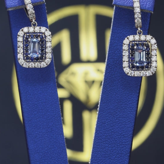 Natural emerald-cut sapphire double halo drop earrings in 14K white gold with 0.78CT G-H SI diamonds – Houston fine jewelry by Endless Diamonds.