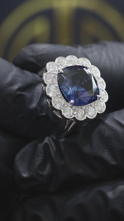 Sapphire & Diamond Halo Ring in White Gold | 6.73 CT Sapphire + 1.77 CTW Diamonds