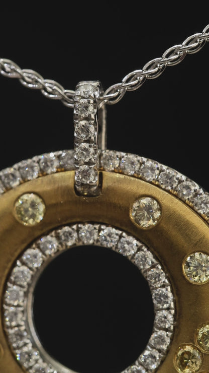 Natural Fancy Yellow Diamond Open Circle Pendant with Pavé Halo in Two-Tone Gold | Modern Luxury Design