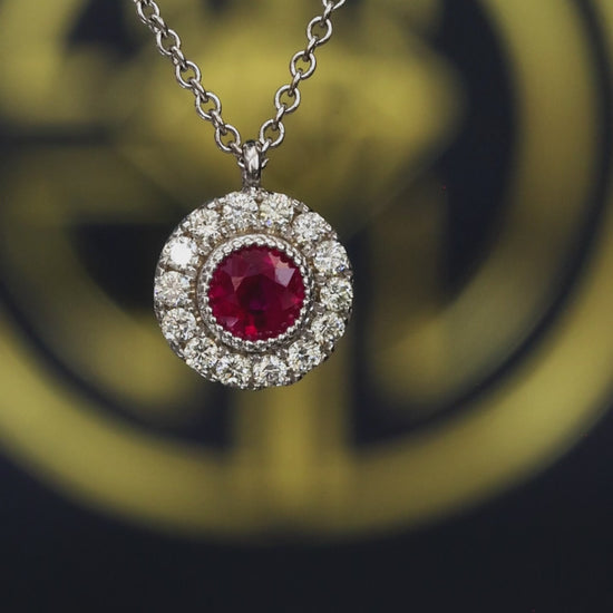 Round 0.30 carat ruby double halo pendant in 14K white gold with 0.14 carat G-H SI diamonds Houston jewelry store Endless Diamonds