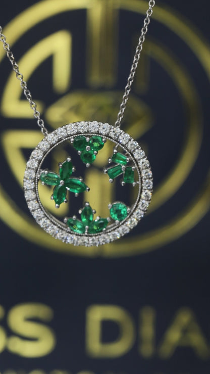 14K white gold emerald floral halo pendant with 0.88 carat emerald cluster and 0.74 carat G-H SI diamond circle frame