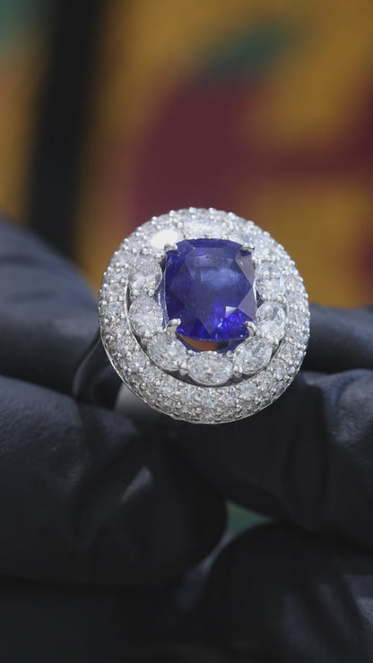Blue Sapphire & Diamond Halo Ring in White Gold | 7.18 CTW