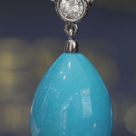 14K yellow gold turquoise teardrop pendant with bezel-set 0.24 carat G-H SI diamond connector