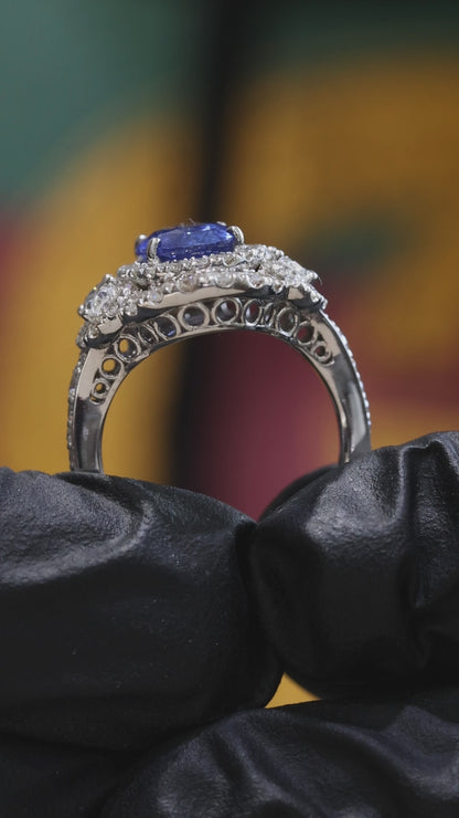 Oval Blue Sapphire Double Halo Ring with Diamond Accents | 4.41 CTW