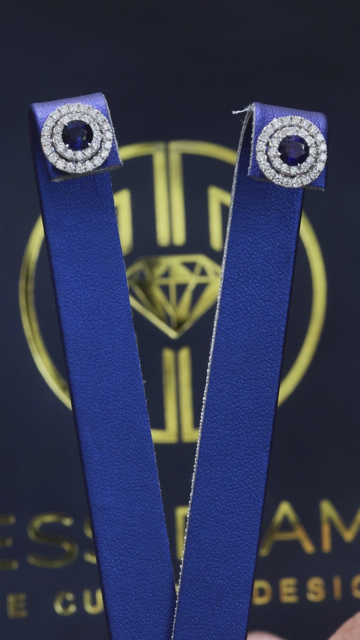 Natural round sapphire double halo stud earrings in 14K white gold with 0.65CT G-H SI diamonds – luxury Houston fine jewelry by Endless Diamonds.