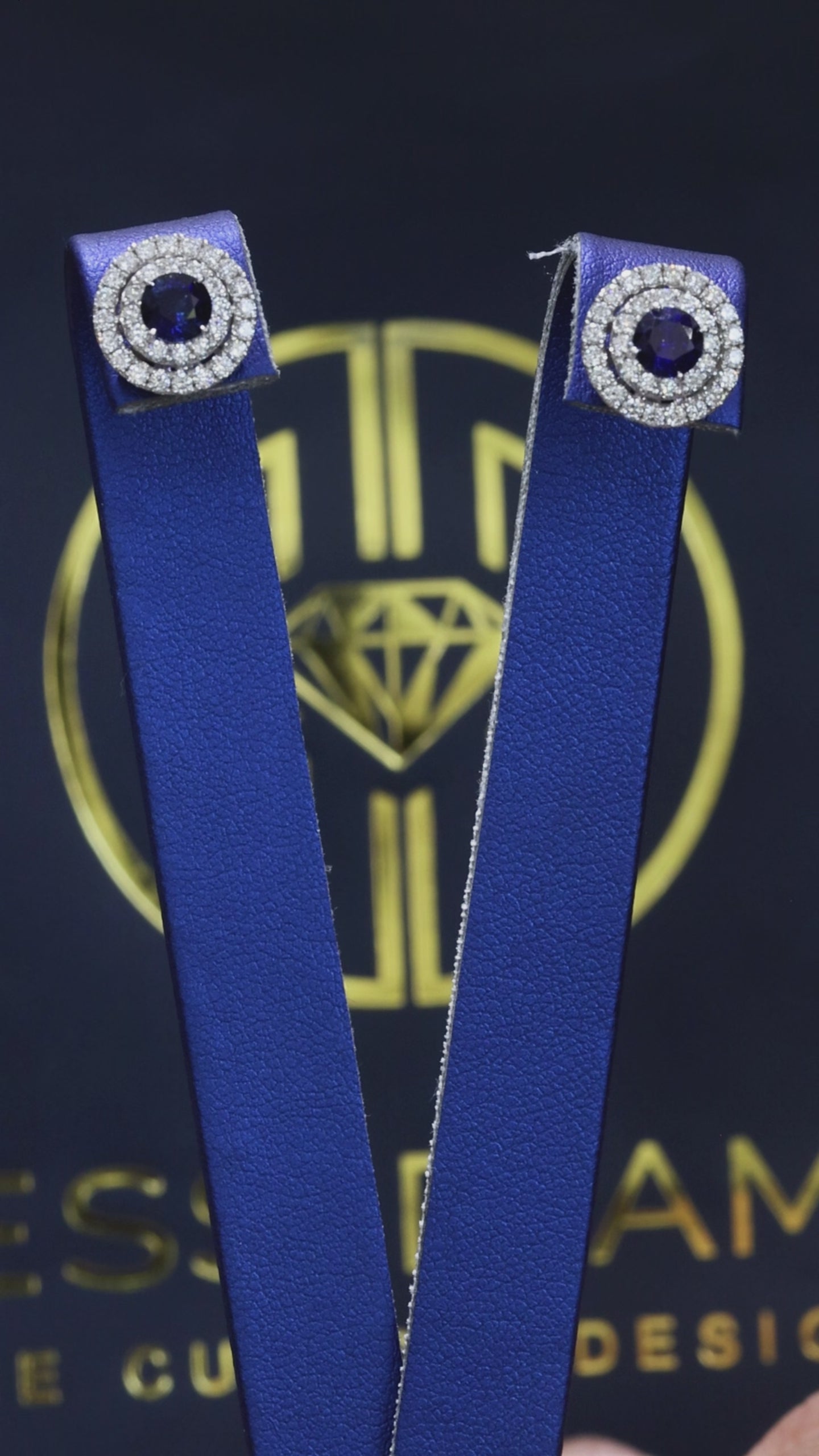 Natural round sapphire double halo stud earrings in 14K white gold with 0.65CT G-H SI diamonds – luxury Houston fine jewelry by Endless Diamonds.
