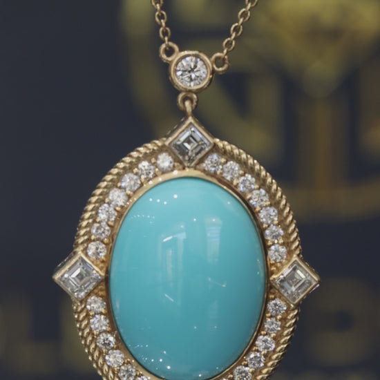 14K yellow gold oval turquoise halo pendant with 19x15mm cabochon center and 1.8 carat G-H SI diamond rope frame design