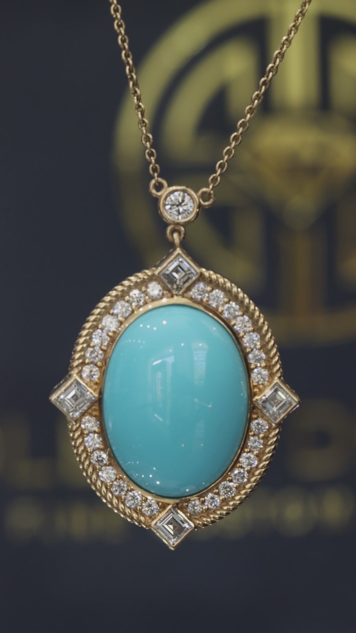 14K yellow gold oval turquoise halo pendant with 19x15mm cabochon center and 1.8 carat G-H SI diamond rope frame design